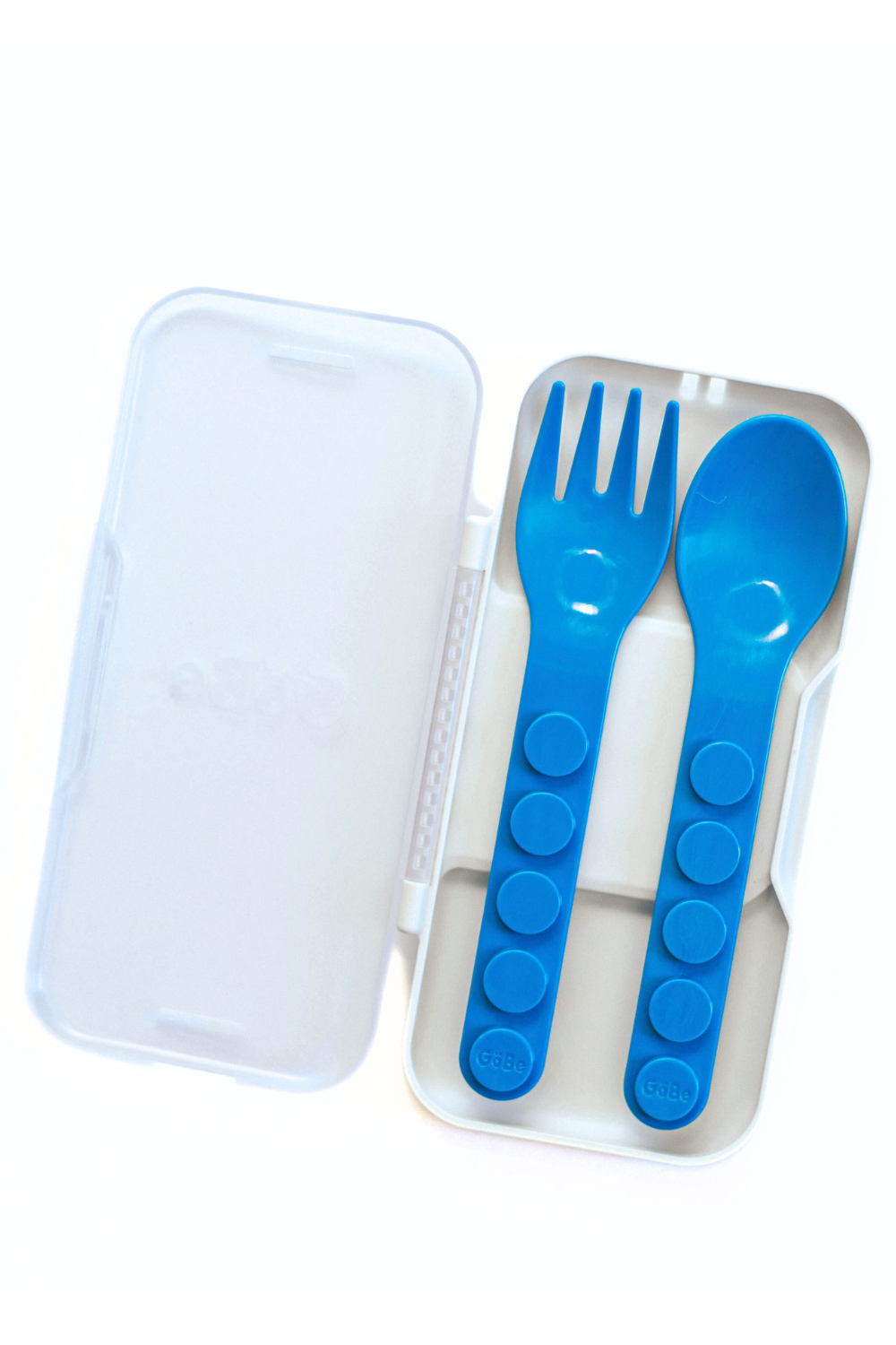 Blue fork and spoon set in a clear case on a white background